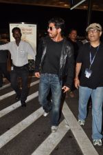 Shahrukh Khan with son snapped at airport in Mumbai on 25th Aug 2014